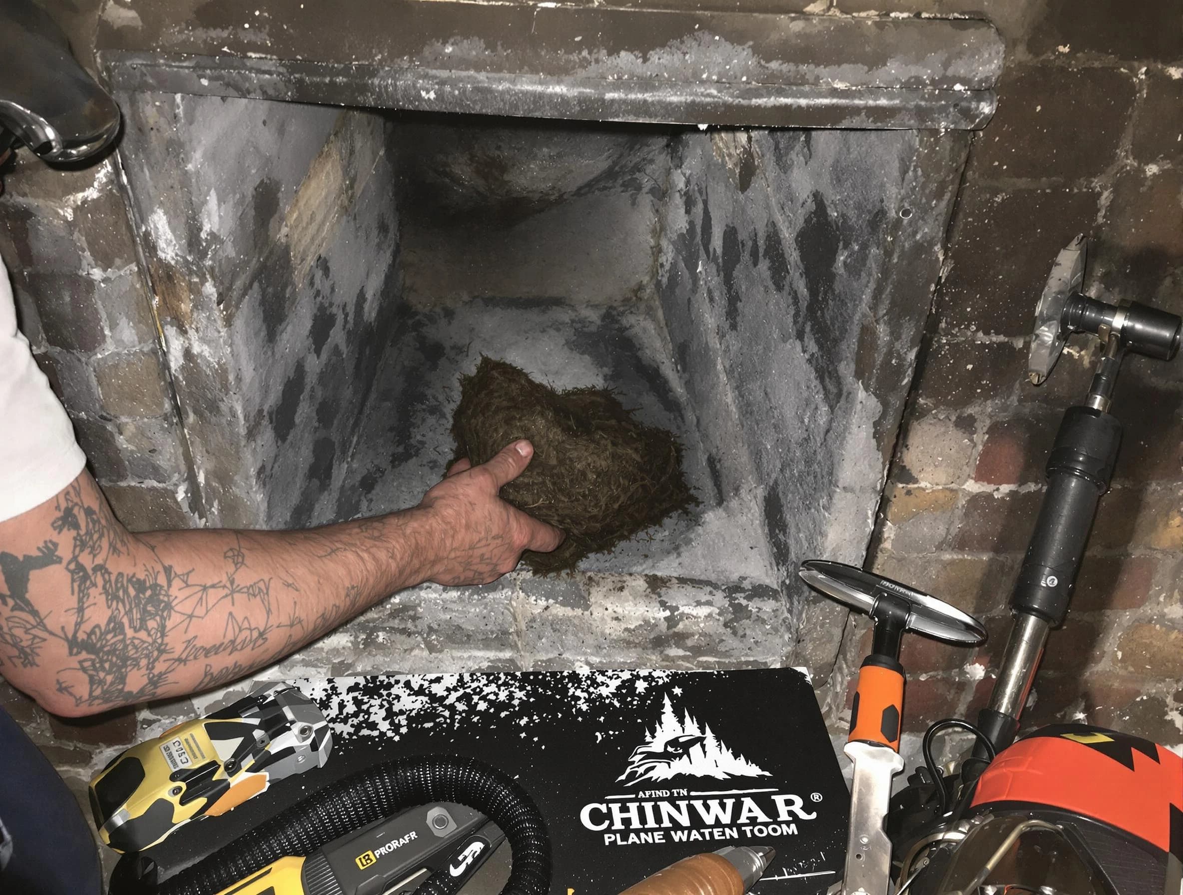 Mesa Chimney Sweep safely removing debris and screening chimney in Mesa, AZ