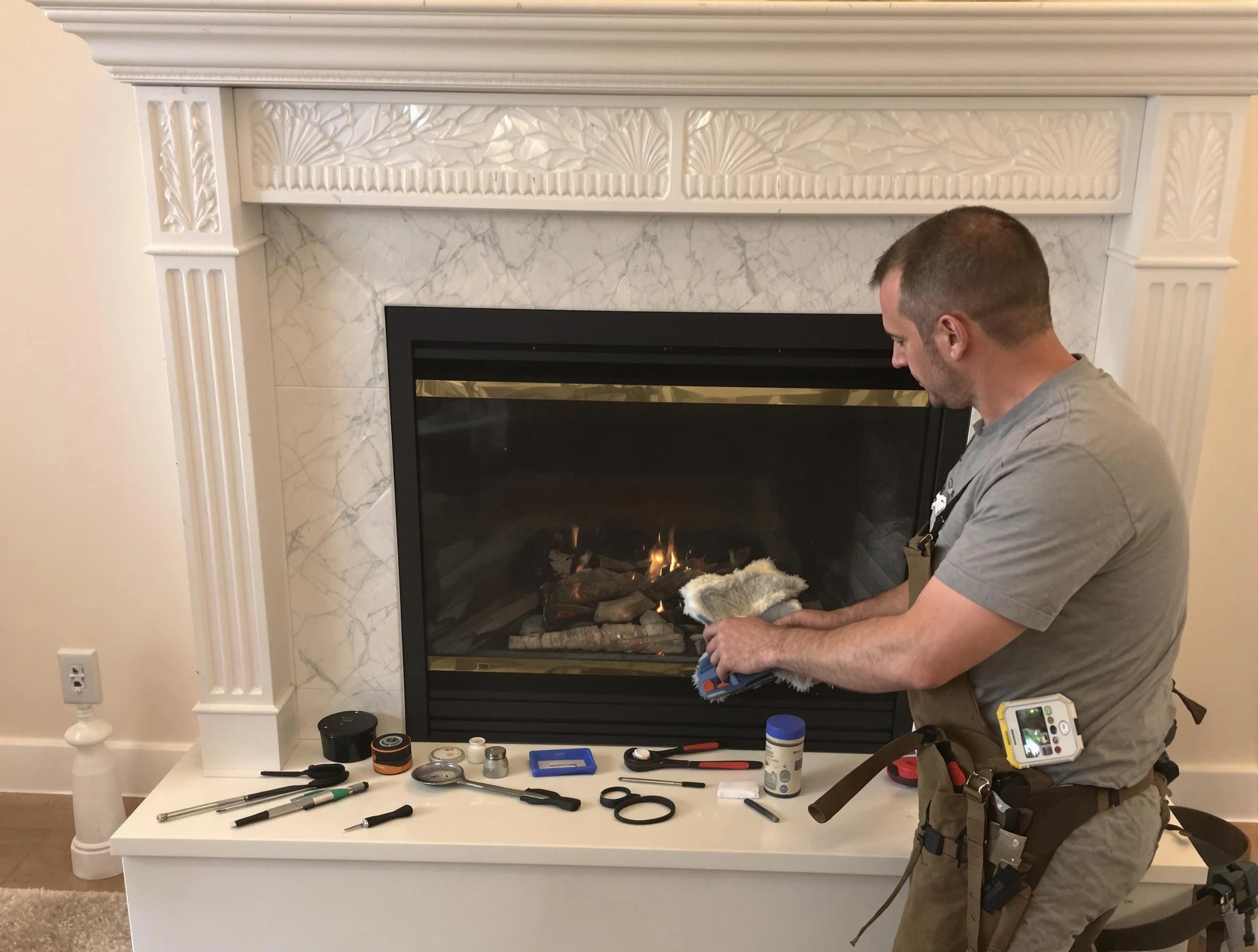 Mesa Chimney Sweep performing fireplace maintenance in Mesa, AZ