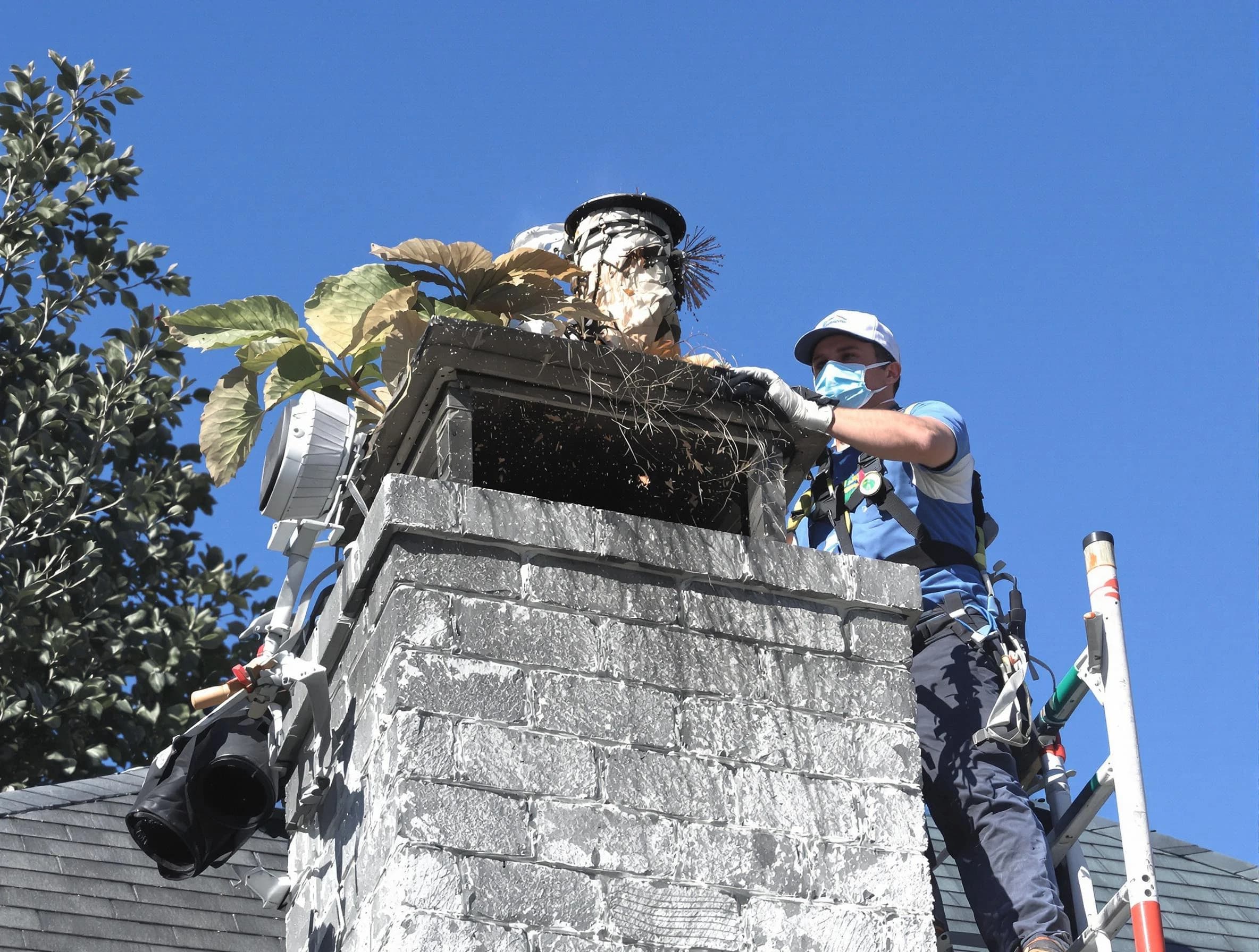 Mesa Chimney Sweep specialist performing chimney cleaning in Mesa, AZ